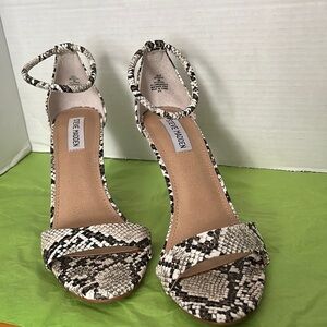Steve Madden, size 9 black & white Snake print heels. Gently worn